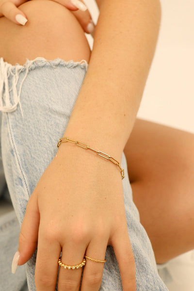 The Viral Paperclip Bracelet In Gold On Models Wrist