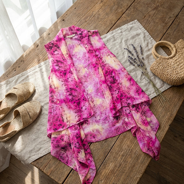 Pink Paisley Chiffon Vest By Lavello Laying Flat on Wooden Table