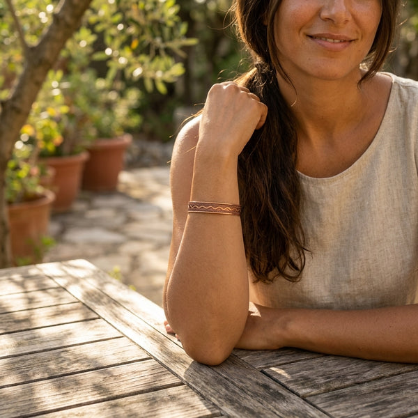 Genuine copper bracelet on woman's wrist