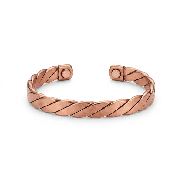 Copper cuff bracelet in twisted design on a white background